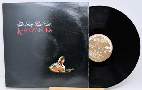 Vinyl record with cover featuring a guitar player and album title 'Manzanita' on a white background