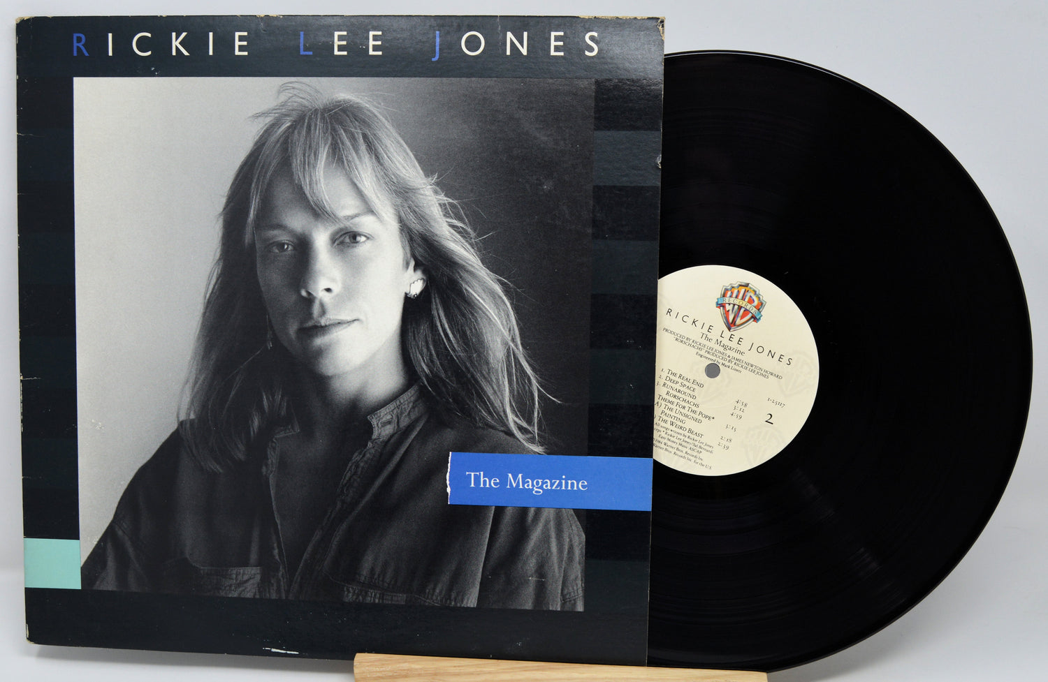 Vinyl record with cover featuring a portrait and album title 'The Magazine' by Rickie Lee Jones.