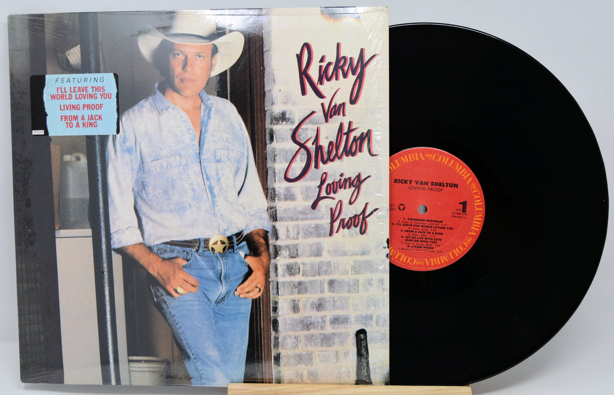 Vinyl record with cover featuring a person wearing a cowboy hat and jeans, titled 'Loving Proof' by Ricky Van Shelton.