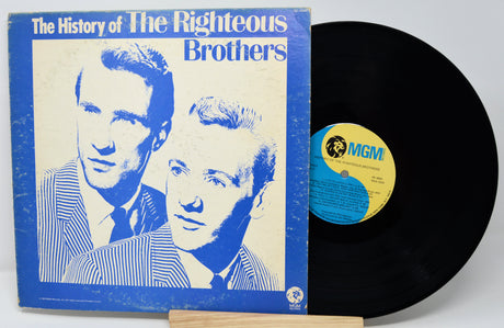 Vinyl record and cover titled 'The History of The Righteous Brothers' with MGM label.