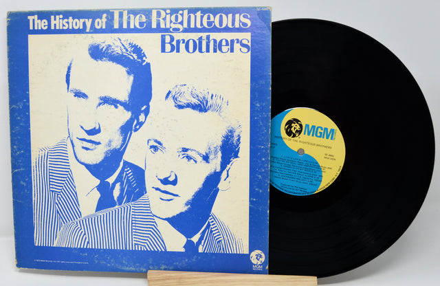 Vinyl record and cover titled 'The History of The Righteous Brothers' with MGM label.