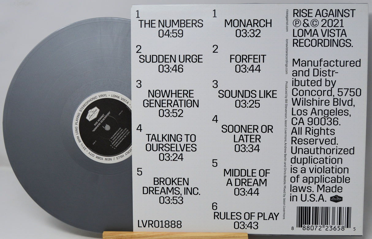Vinyl record with label showing tracklist and branding