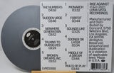 Vinyl record with label showing tracklist and branding