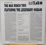 The back cover of a vinyl record sleeve for 'The Max Roach Trio Featuring the Legendary Hasaan' on Atlantic Records, showing tracklist text, biographical copy, and a 'Sereo 45' logo.