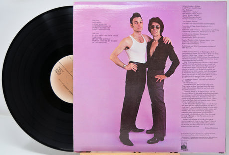 Vinyl record with a back cover featuring Robert Gordon With Link Wray and text on a pink background
