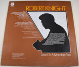 Back cover of Robert Knight 'Love On A Mountain Top' album featuring silhouette artwork and song listings