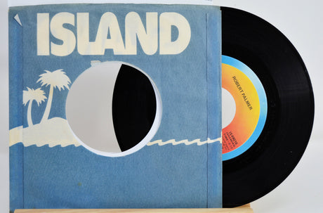 Vintage Island Records 45 RPM vinyl single featuring Robert Palmer partially in branded sleeve
