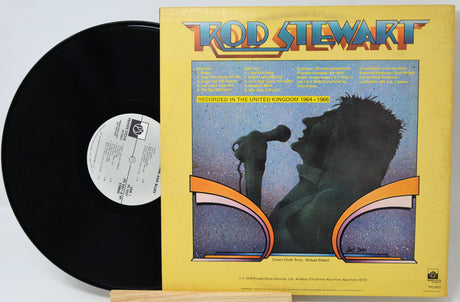 Vinyl record with matching cover featuring a desert landscape and person.