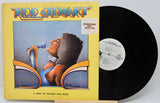 Vinyl record and cover with 'Rod Stewart' on a white background