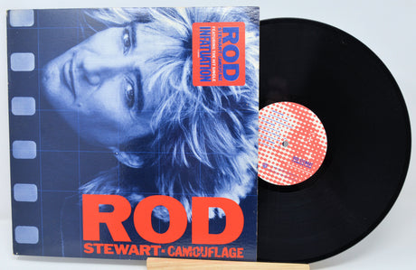 Vinyl record with cover featuring Rod Stewart's face and album title 'Camouflage'.