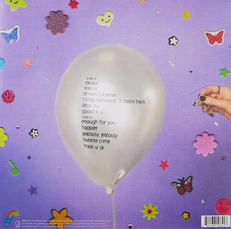 White balloon with text on a purple background with decorative elements