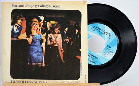 Vinyl record with cover featuring The Rolling Stones and text 'You can't always get what you want'.