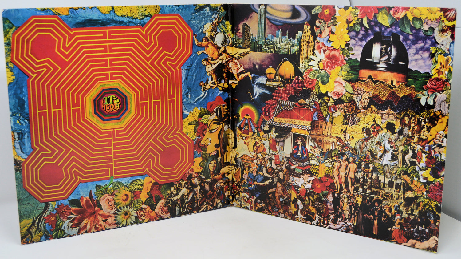 Colorful album cover with intricate design and text