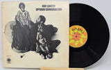 Ron Carter's 'Uptown Conversation' vinyl record LP, showing the cream-colored album cover with black-and-white cover art and the black record partially pulled out, revealing a yellow and orange 'Embryo' label.