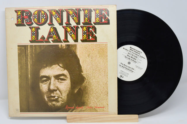 Front cover of Ronnie Lane's Slim Chance vinyl LP featuring Ronnie Lane's portrait and bold title