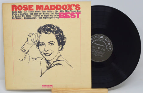 Front cover and vinyl record of Rose Maddox's Best with illustrated portrait and track titles