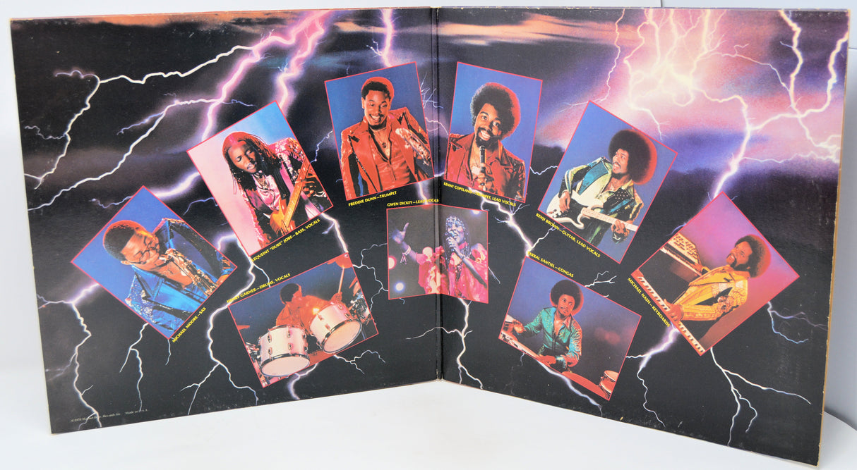 Album cover with colorful portraits and lightning effects