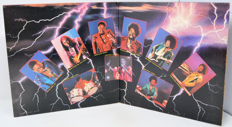 Album cover with colorful portraits and lightning effects