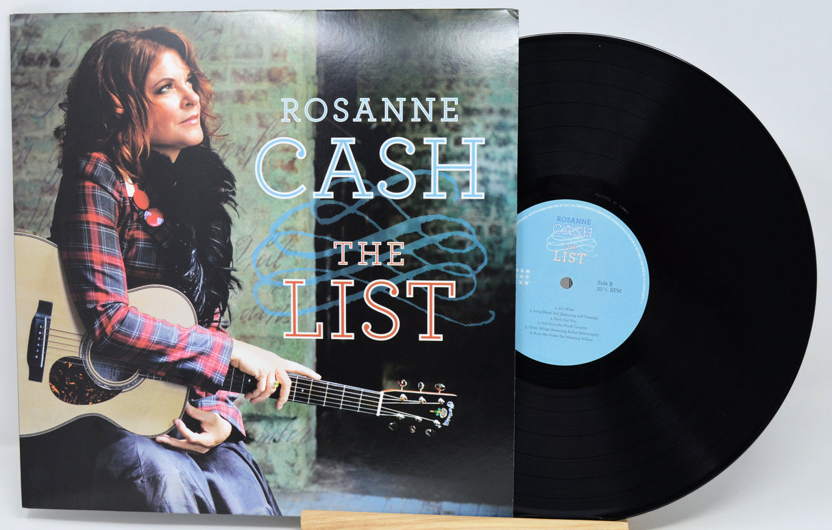 Rosanne Cash - The List vinyl record LP with the album cover standing next to the black record on a light gray background.