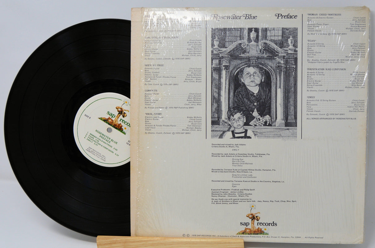 Back cover and vinyl record of Rosewater Blue Preface LP by SAP Records, showing tracklist and monochrome illustration