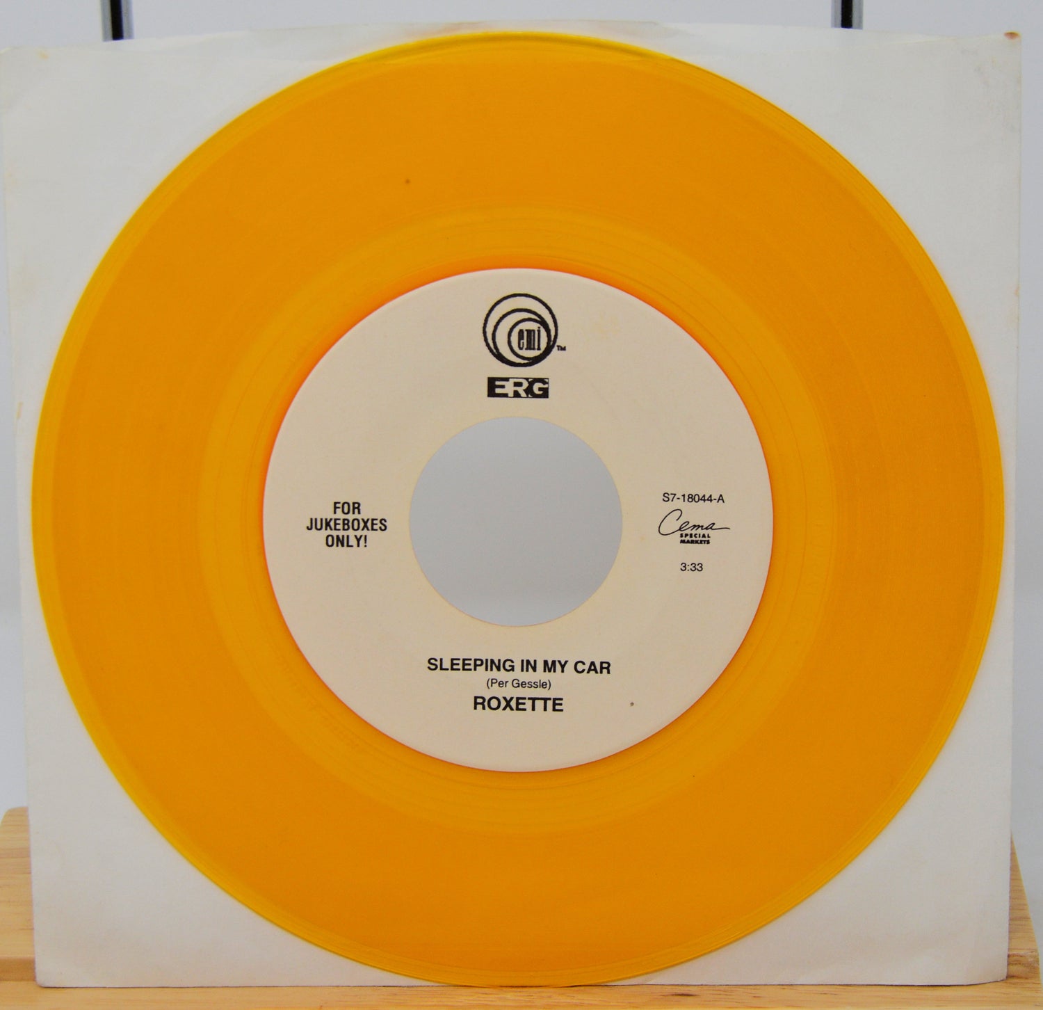 Vinyl record with orange outer sleeve and white inner label displaying 'Roxette' and 'Erg' branding.