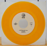 Vinyl record with orange outer sleeve and white inner label displaying 'Roxette' and 'Erg' branding.