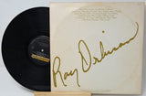 Vinyl record with a signed cover featuring Ray Dolan's signature.