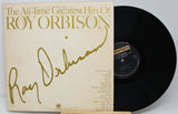 Vinyl record with cover featuring 'The All-Time Greatest Hits Of Roy Orbison' on a white background