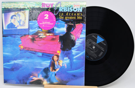 Vinyl record with cover featuring a couple in a romantic scene, on a white background.