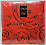 Rush 'Clockwork Angels' vinyl record album cover displayed flat, wrapped in protective plastic with a cardboard insert visible at the bottom.