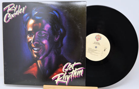 Vinyl record with cover featuring a stylized portrait and 'Get Rhythm' text.