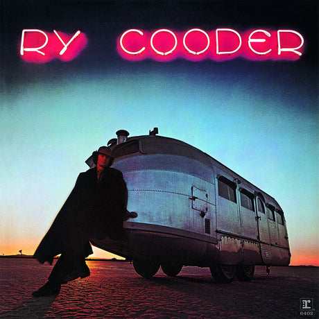 Album cover art for Ry Cooder, featuring a person in a long dark coat leaning against a silver trailer in a desert landscape at sunset, with the text 'RY COODER' in glowing pink letters across the top.