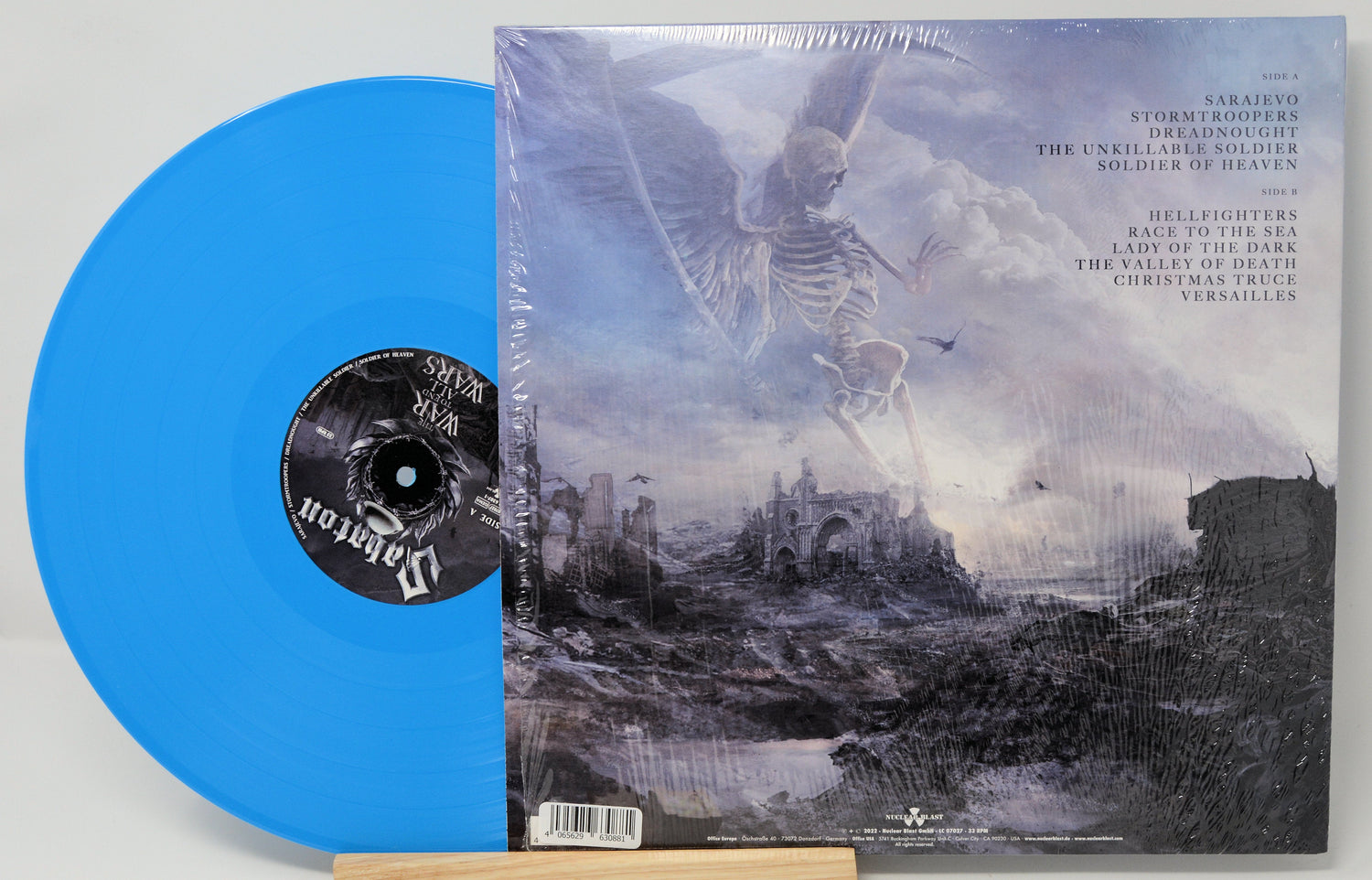 Back cover and Pacific Blue vinyl record of Sabaton's The War to End All Wars with tracklist and epic art
