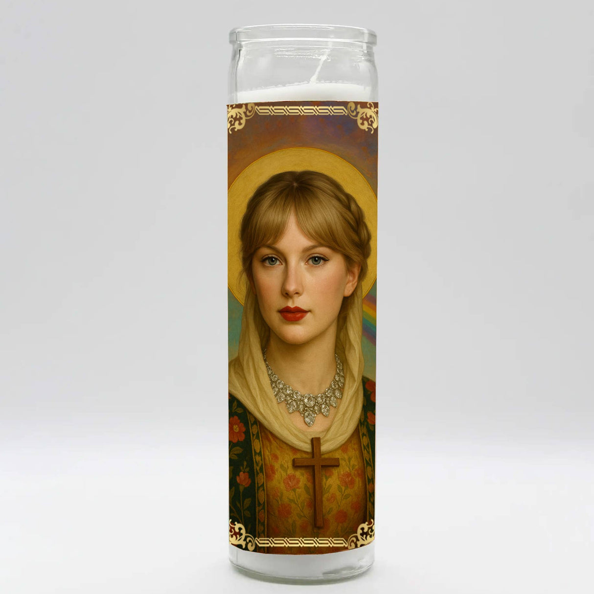 Decorative prayer candle featuring a saintly portrait of a blonde woman with a halo and ornate necklace