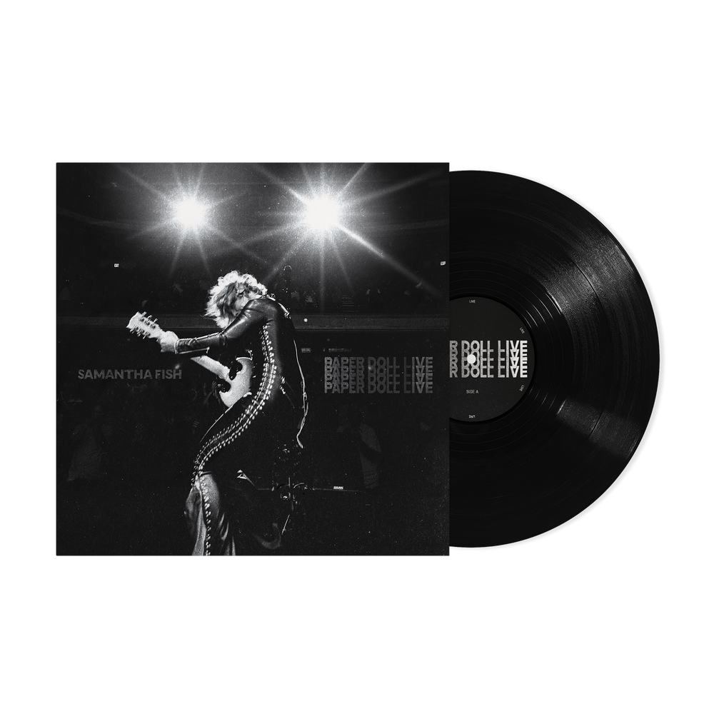 Vinyl record with a black and white photo of a performer on the cover