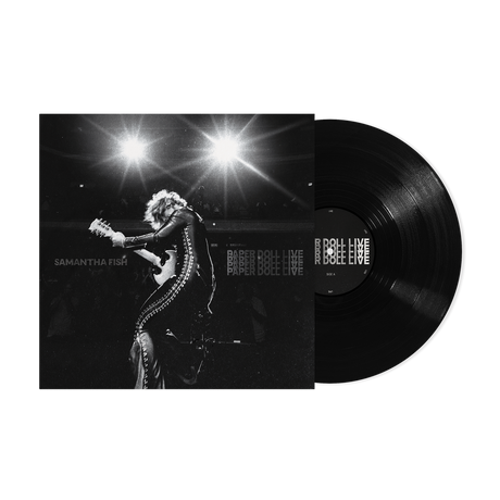 Vinyl record with a black and white photo of a performer on the cover