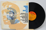 Front cover art and vinyl record of Sammy Davis Jr.'s Greatest Hits featuring bold design