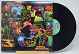 Vinyl record with a colorful cover featuring the band Santana and album title 'Beyond Appearances'.