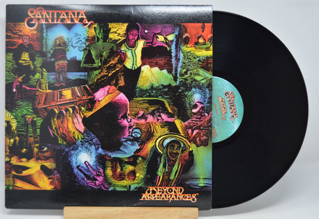 Vinyl record with a colorful cover featuring the band Santana and album title 'Beyond Appearances'.