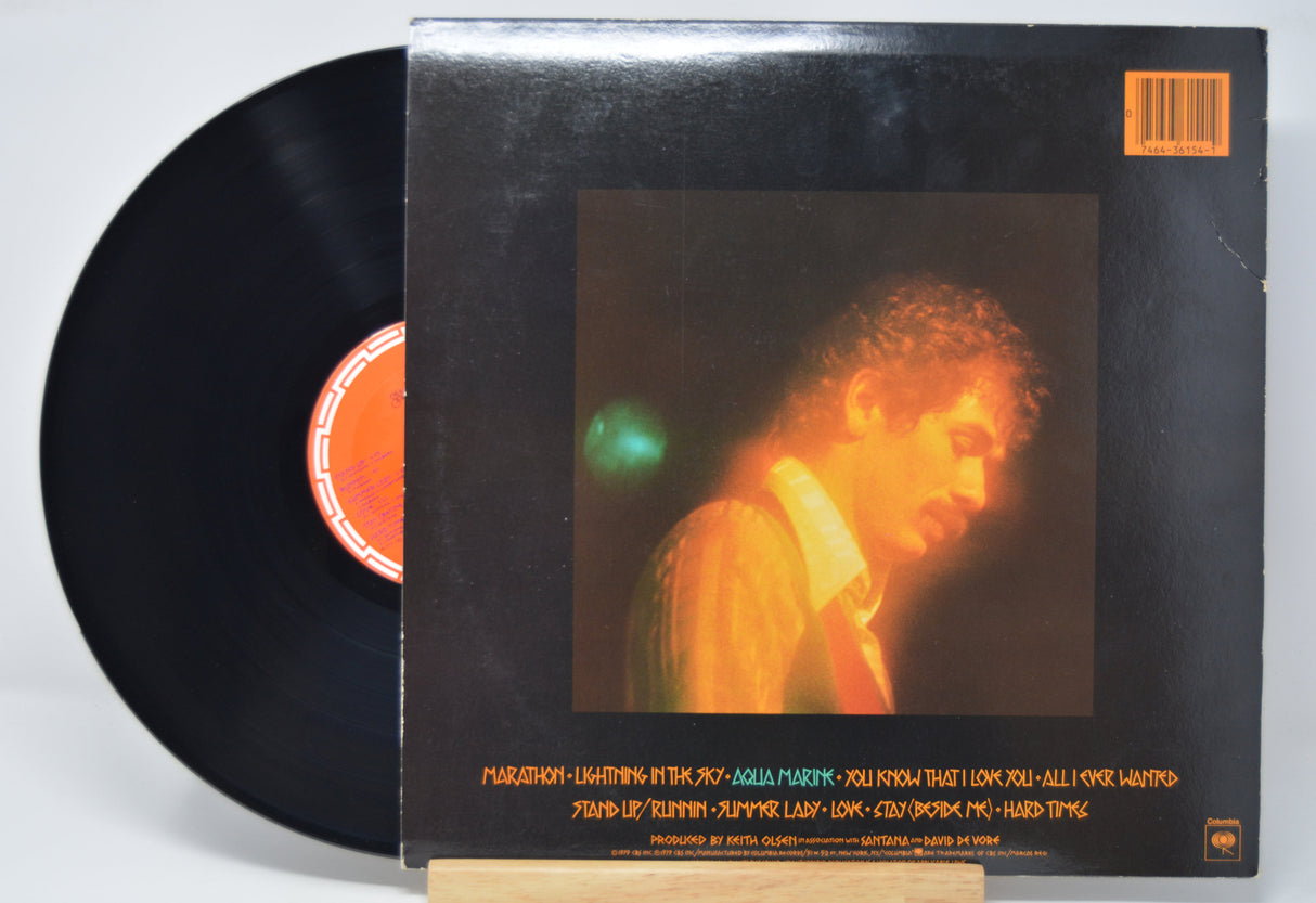 'Santana Marathon' Vinyl record with a cover featuring a person's face and album tracklist.