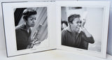 A black and white photographic art print displayed in an open white matted frame, showing two portrait photographs of a woman in different moments.