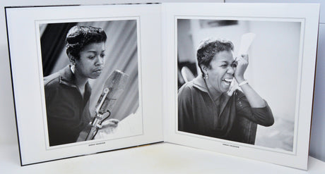 A black and white photographic art print displayed in an open white matted frame, showing two portrait photographs of a woman in different moments.