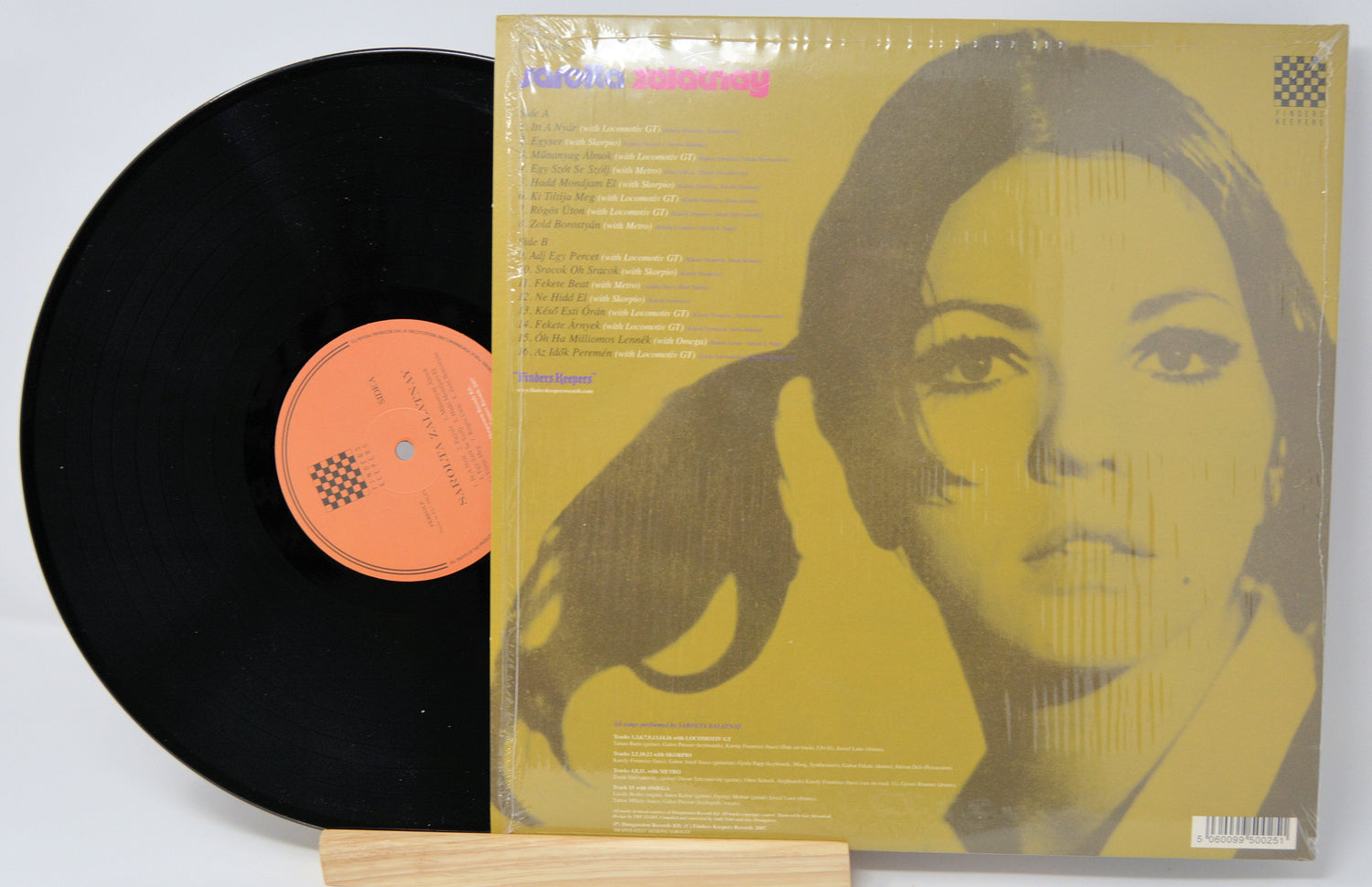 Back cover of Sarolta Zalatnay vinyl LP showing song list and a stylized portrait in yellow tones