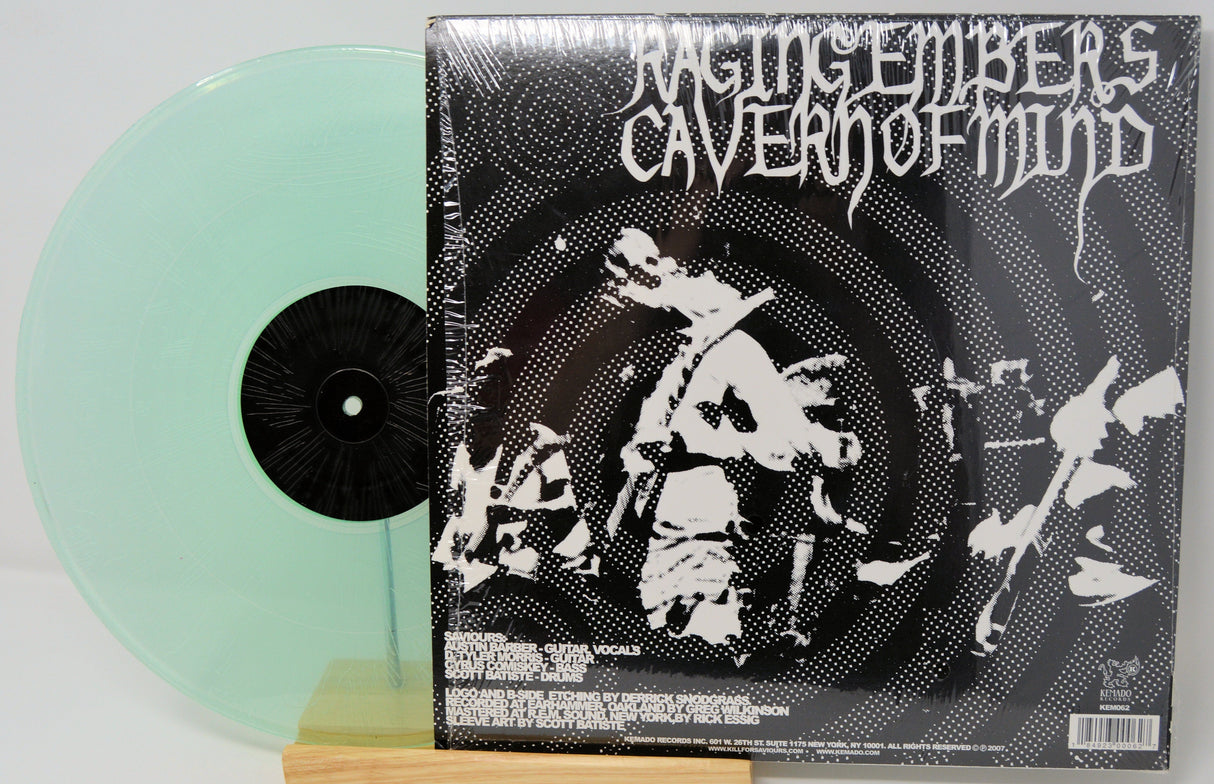 Back cover and mint green vinyl of Saviours Cavern of Mind LP with monochrome artwork