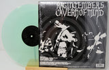 Back cover and mint green vinyl of Saviours Cavern of Mind LP with monochrome artwork
