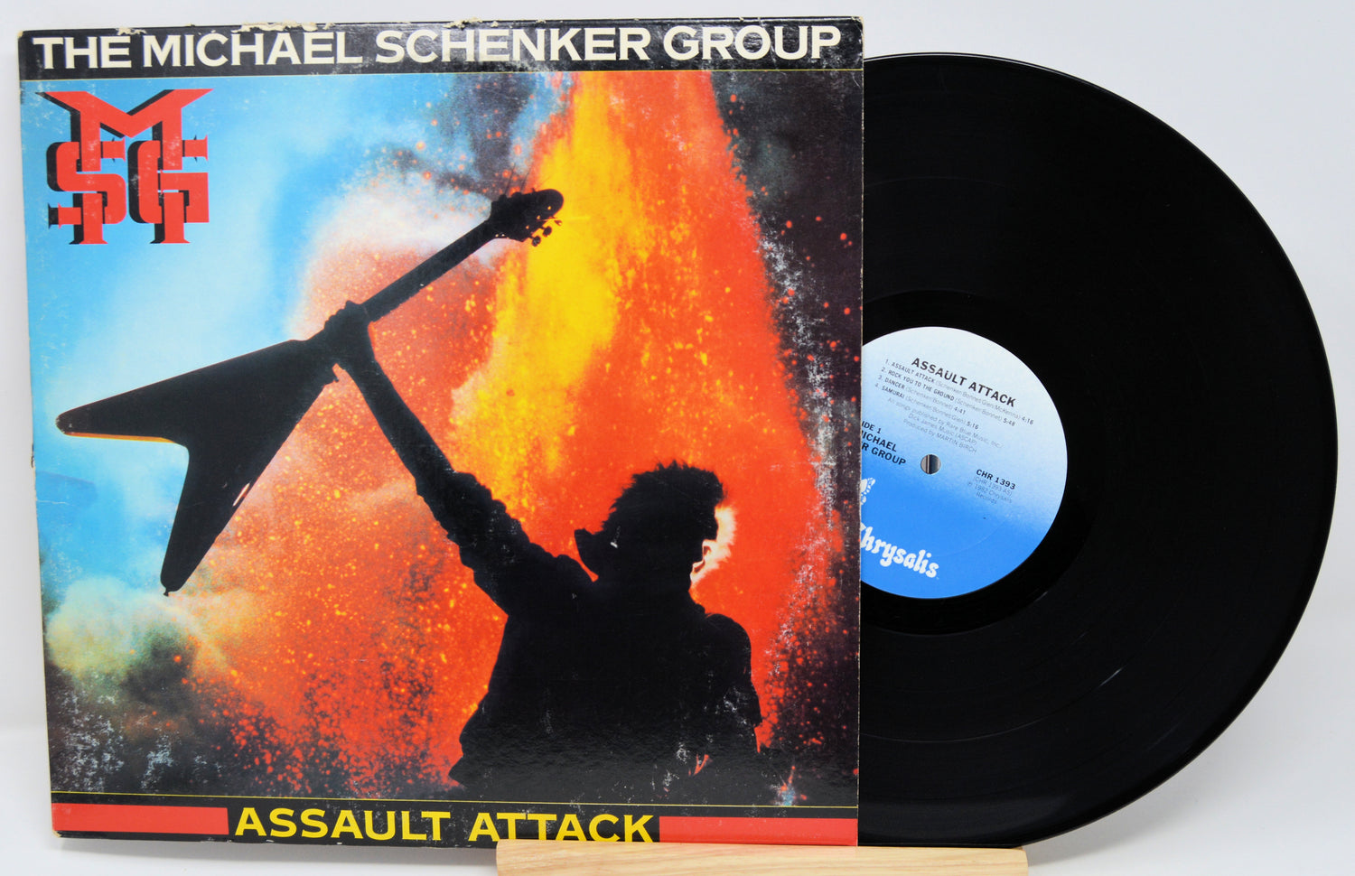 Vinyl record and cover of The Michael Schenker Group's 'Assault Attack' album.