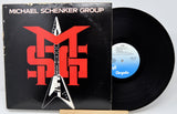 Vinyl record with cover featuring 'Michael Schenker Group' logo on a white background