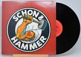 'Schon Hammer Here To Stay' Vinyl record with album cover featuring an arm holding a hammer, red background and black vinyl disc.