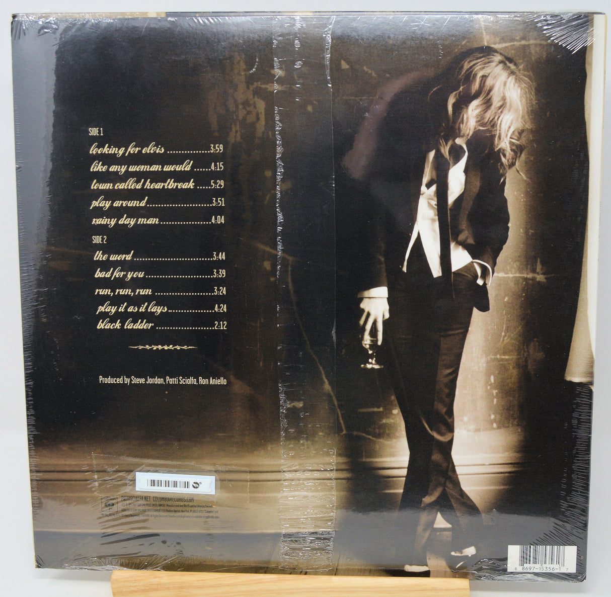 Vinyl record sleeve with album cover and tracklist on a white background