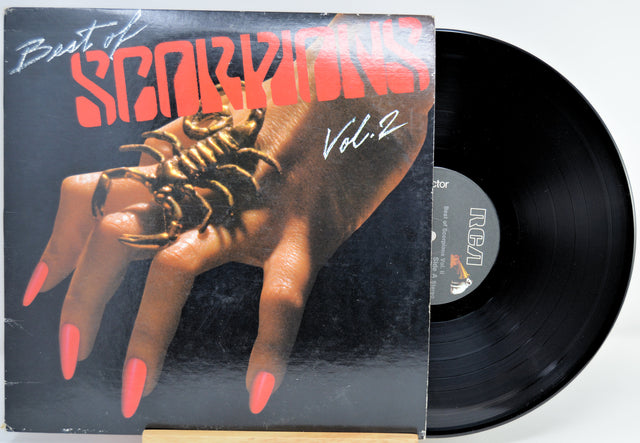 Scorpions Best Of Volume 2 Vinyl record with cover featuring a hand and snake design, on a white background